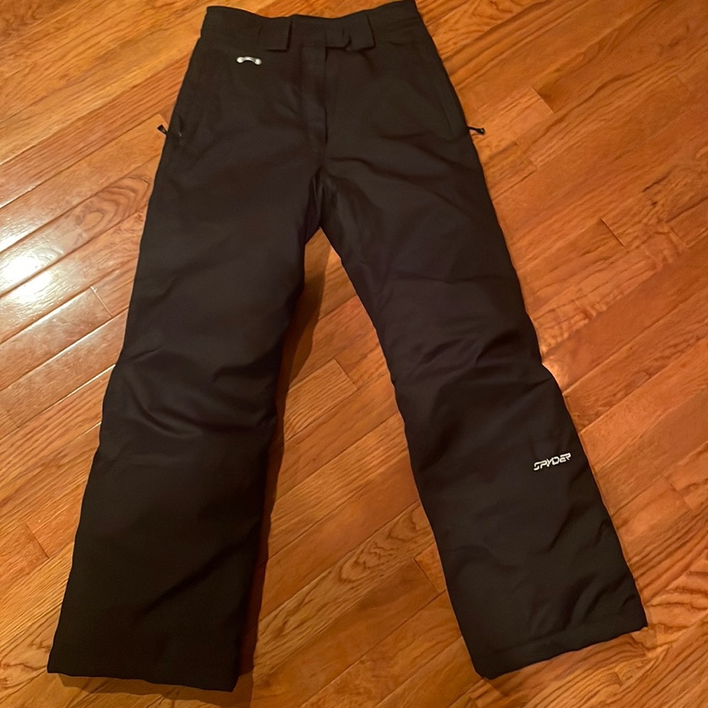 Boys size 16 black spyder snow pants. Stay warm while skiing/playing in the snow